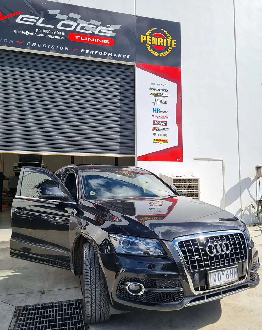 Audi outside the Veloce Tuning shopfront