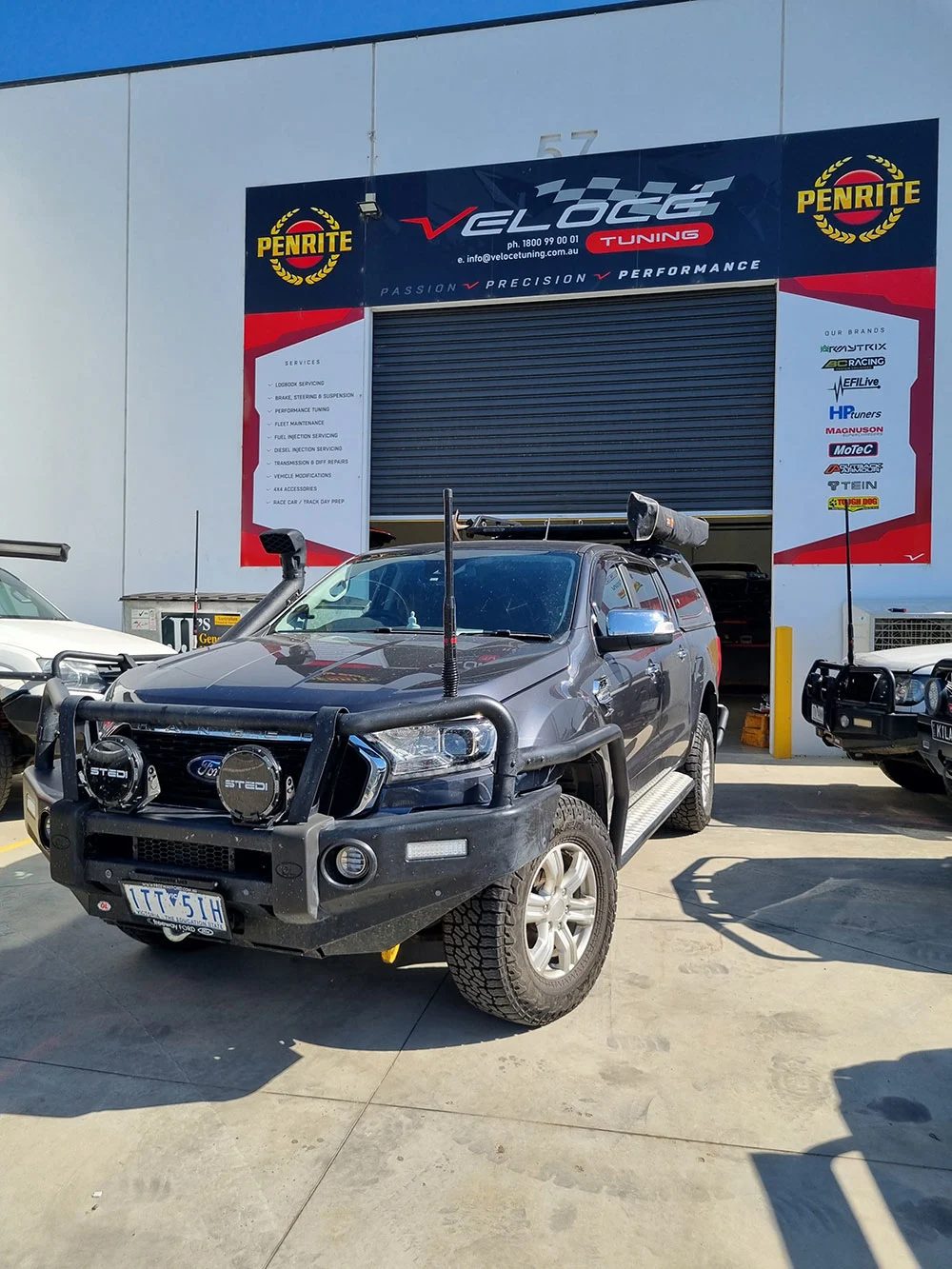 Toyota Hilux outside Veloce Tuning